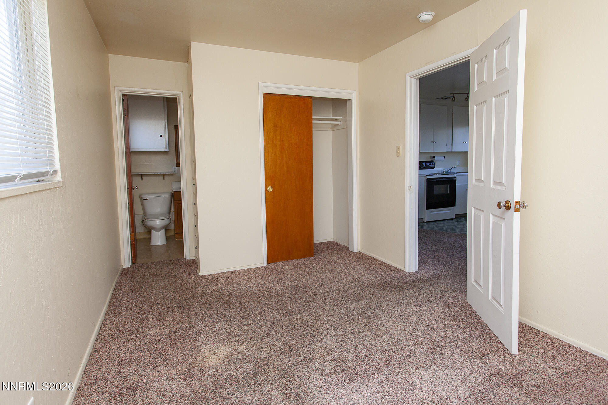 1060 Wilson Avenue Reno, NV 89502 - Photo 15 of 17 an empty room with closet and a bathroom