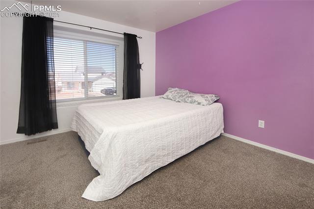 8107 Oliver Road Peyton, CO 80831 - Photo 19 of 36 2nd bedroom on upper floor.