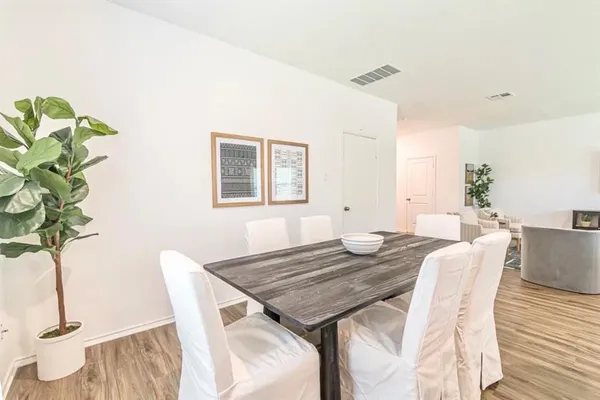 a view of a dining room with furniture