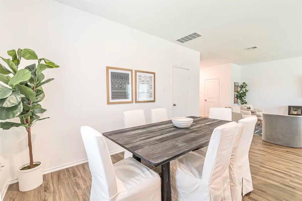 441 Gabbro Gardens Maxwell, TX 78656 - Photo 7 of 22 a view of a dining room with furniture