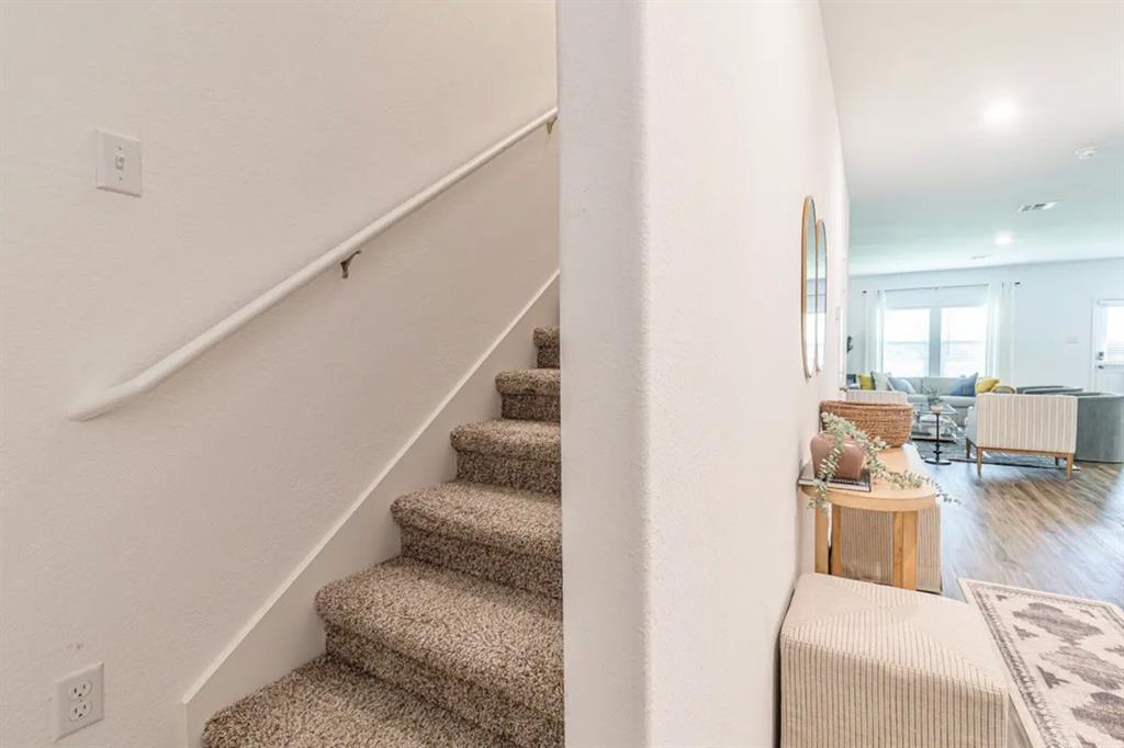 441 Gabbro Gardens Maxwell, TX 78656 - Photo 10 of 22 a living room with furniture and stairs