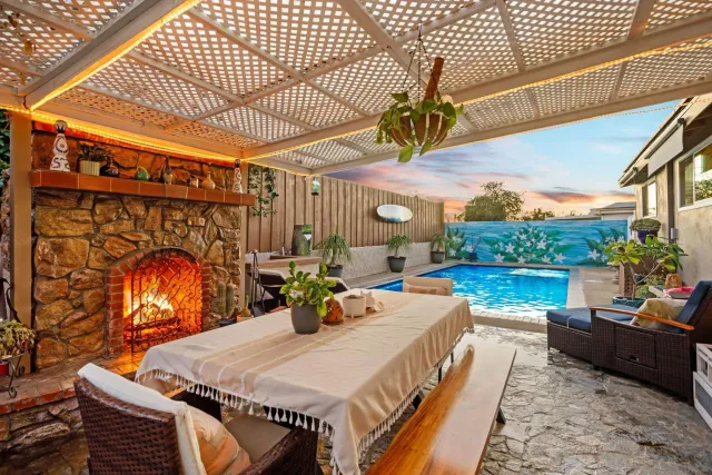 a view of a patio with couches table and chairs