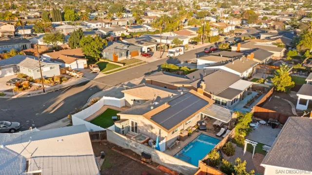 an aerial view of a building with outdoor space