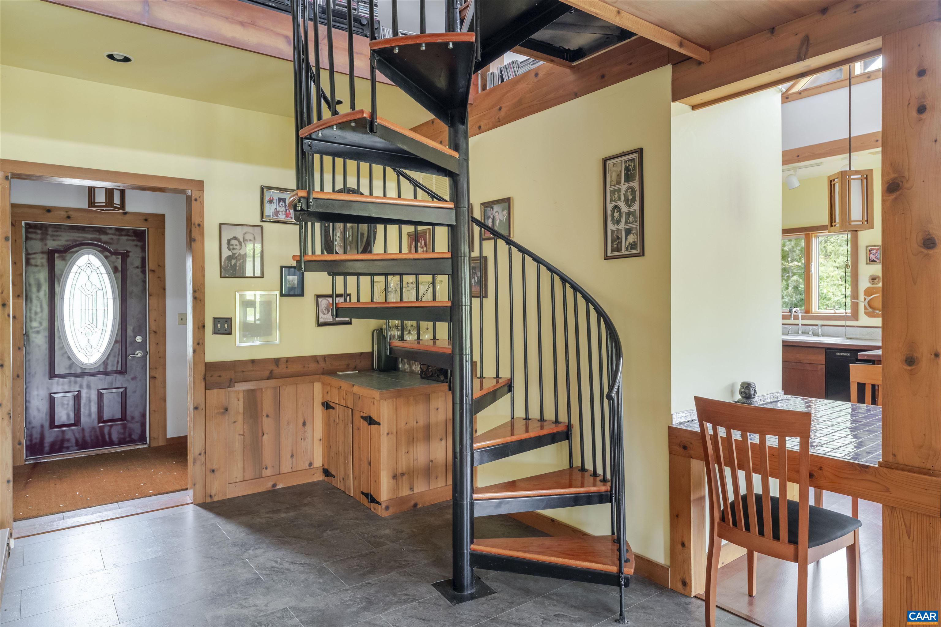 787 Durrett Town Road Afton, VA 22920 - Photo 11 of 49 a view of a livingroom with furniture and staircase