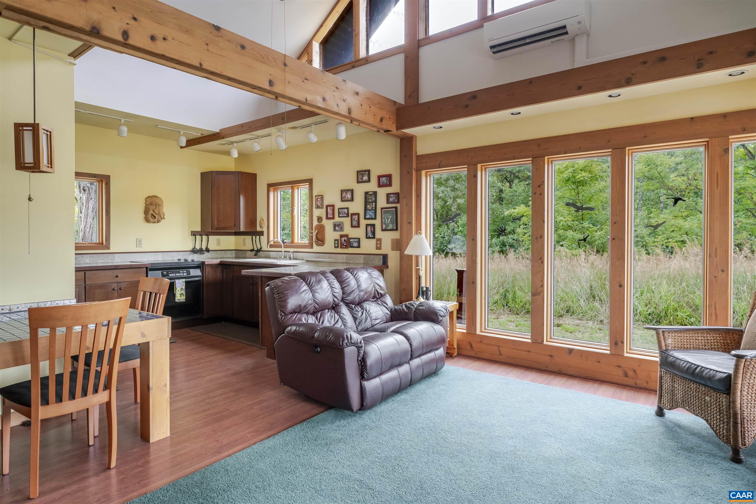 787 Durrett Town Road Afton, VA 22920 - Photo 26 of 49 a living room with furniture and a large window