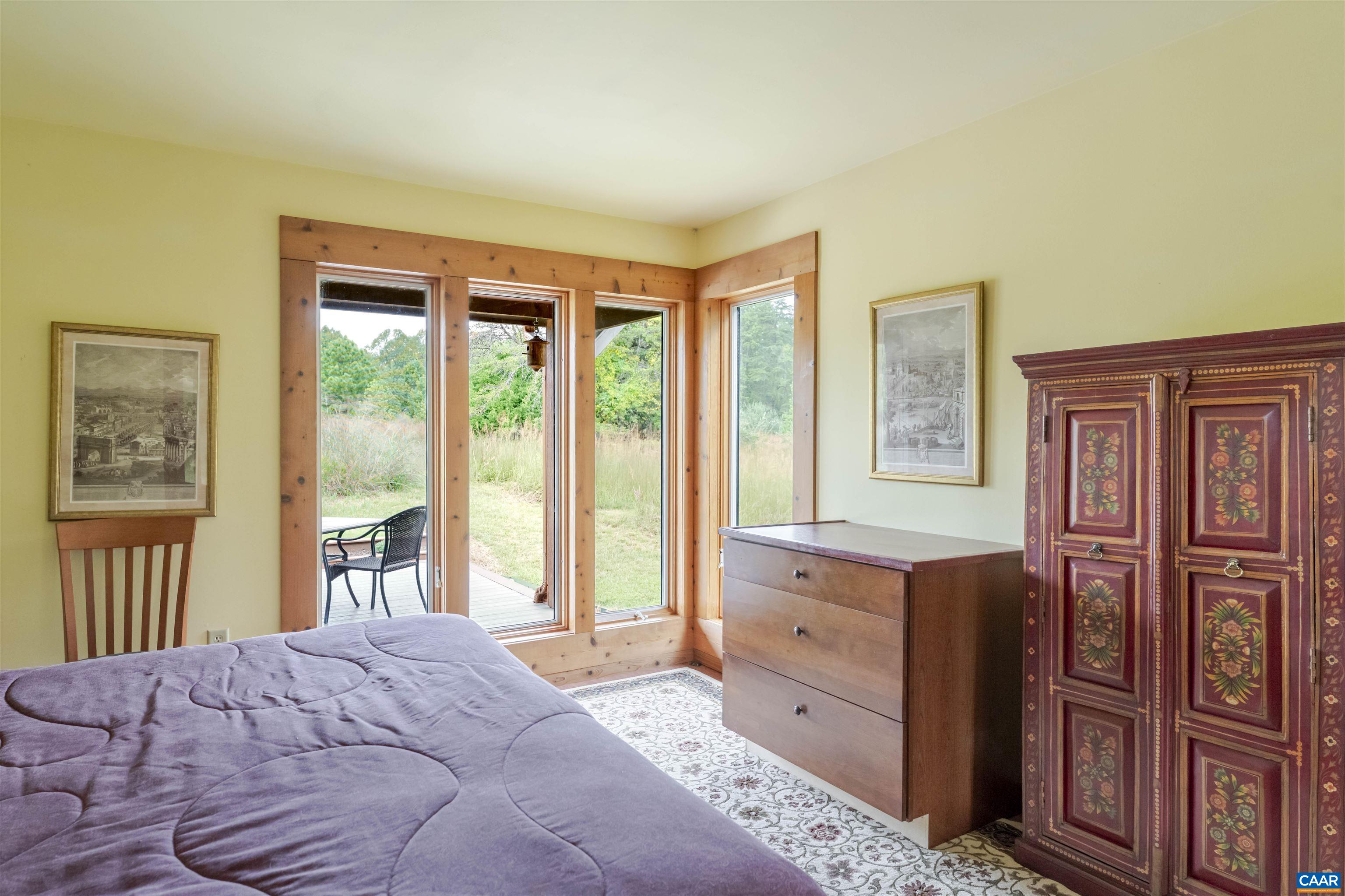 787 Durrett Town Road Afton, VA 22920 - Photo 35 of 49 a bedroom with a bed dresser and a window