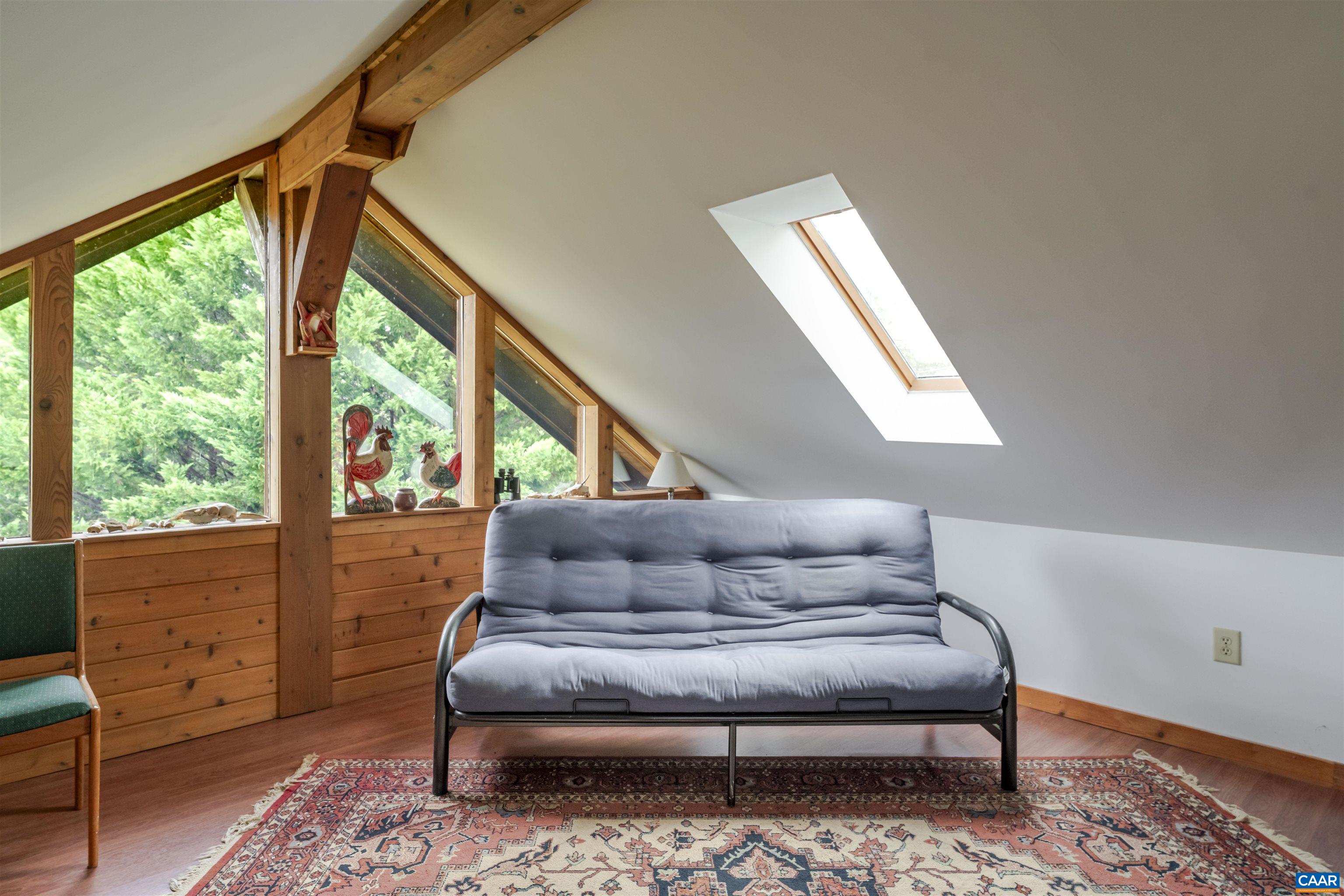 787 Durrett Town Road Afton, VA 22920 - Photo 41 of 49 a living room with furniture and a large window