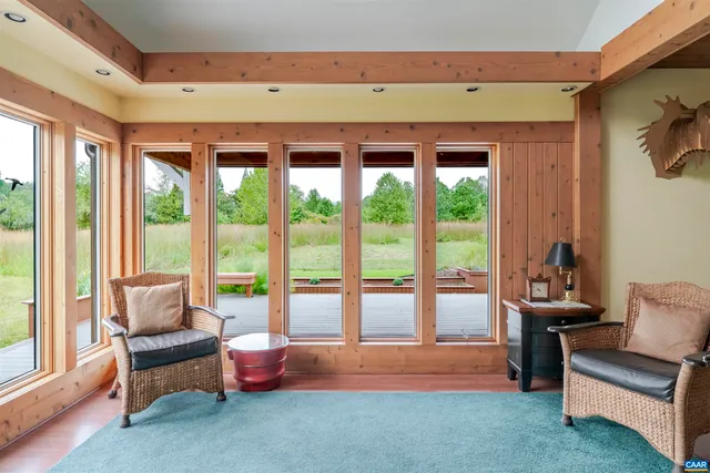 a bedroom with furniture and a window