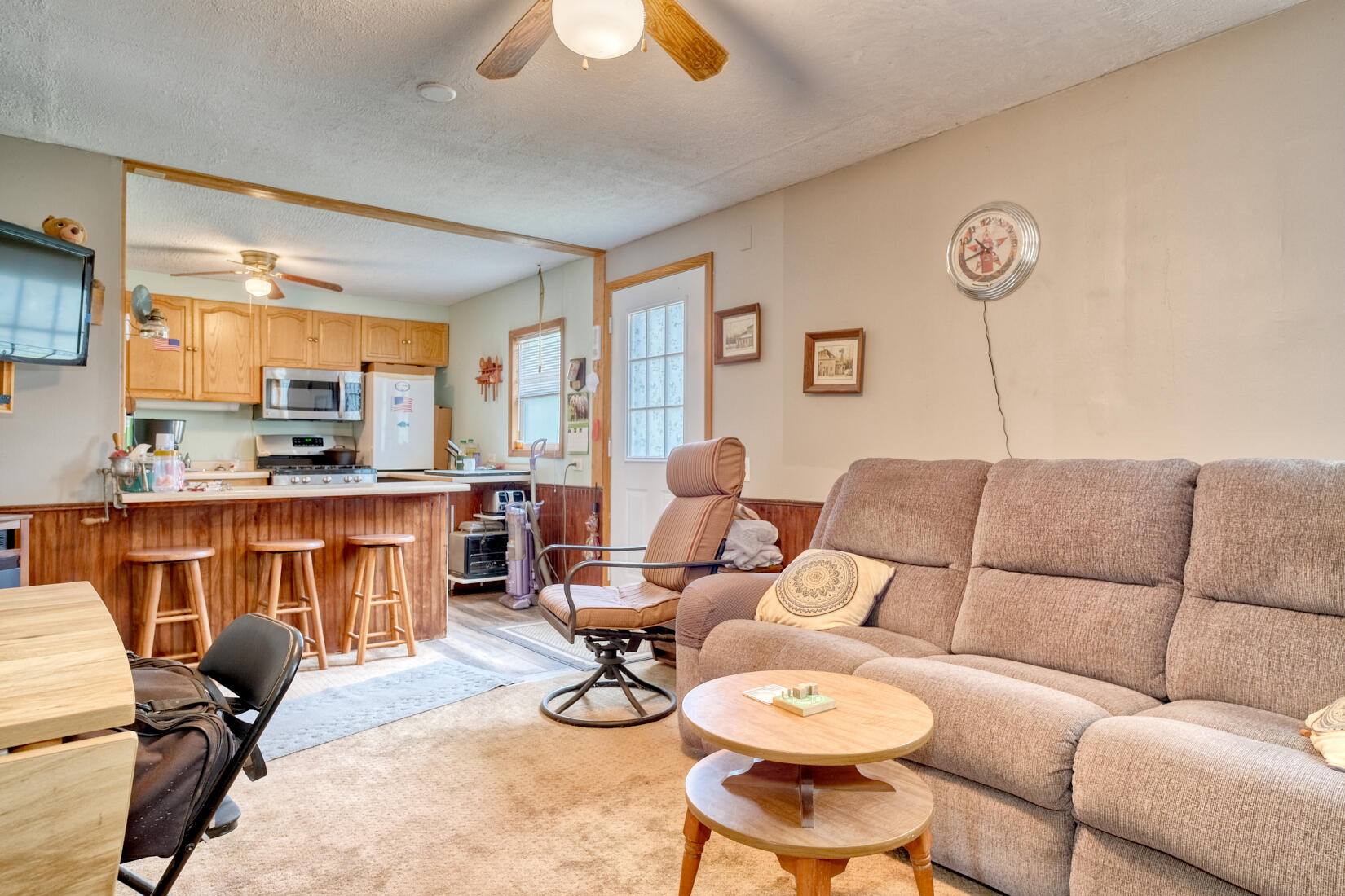 6900 North 600 West Rensselaer, IN 47978 - Photo 12 of 15 a living room with furniture and a kitchen view