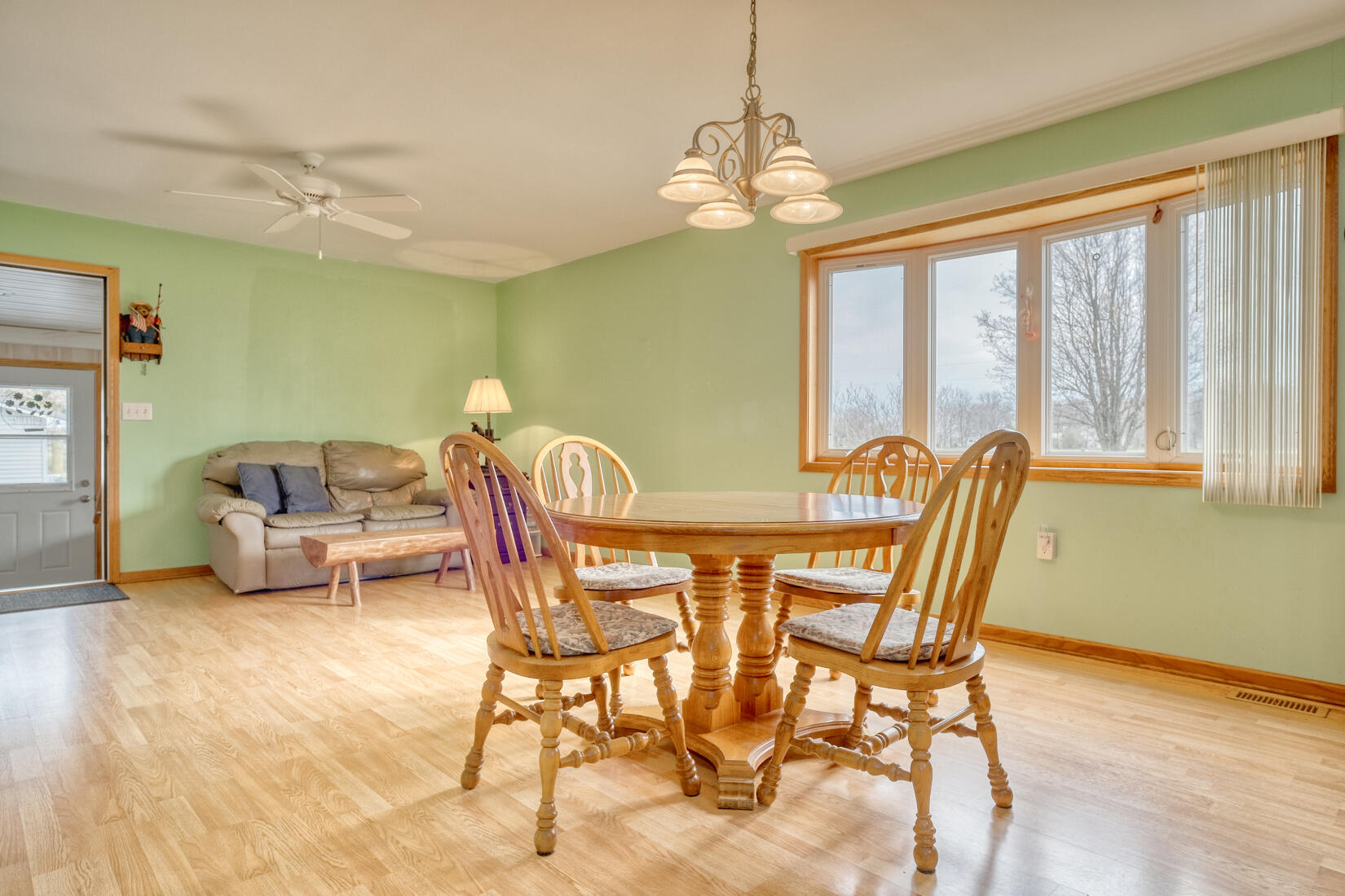 6900 North 600 West Rensselaer, IN 47978 - Photo 2 of 15 a view of a dining room with furniture window and outside view