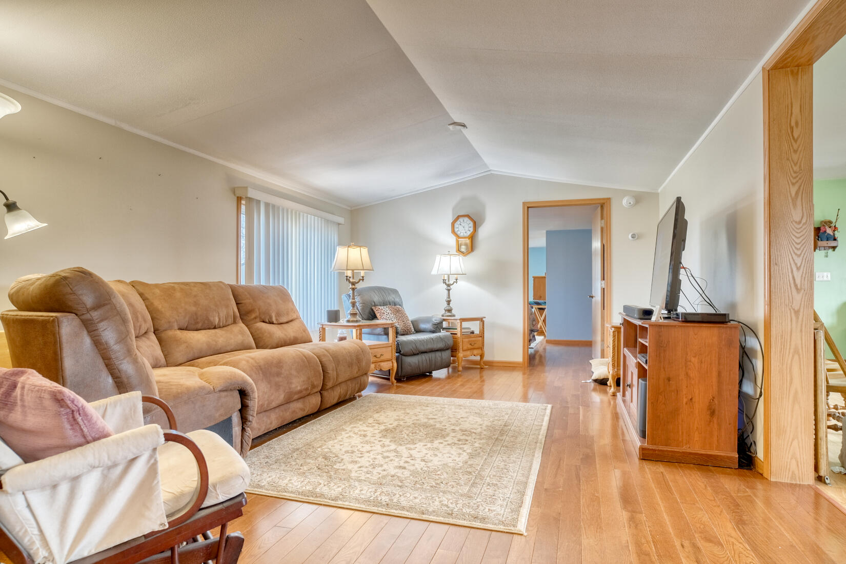 6900 North 600 West Rensselaer, IN 47978 - Photo 4 of 15 a living room with furniture and a wooden floor