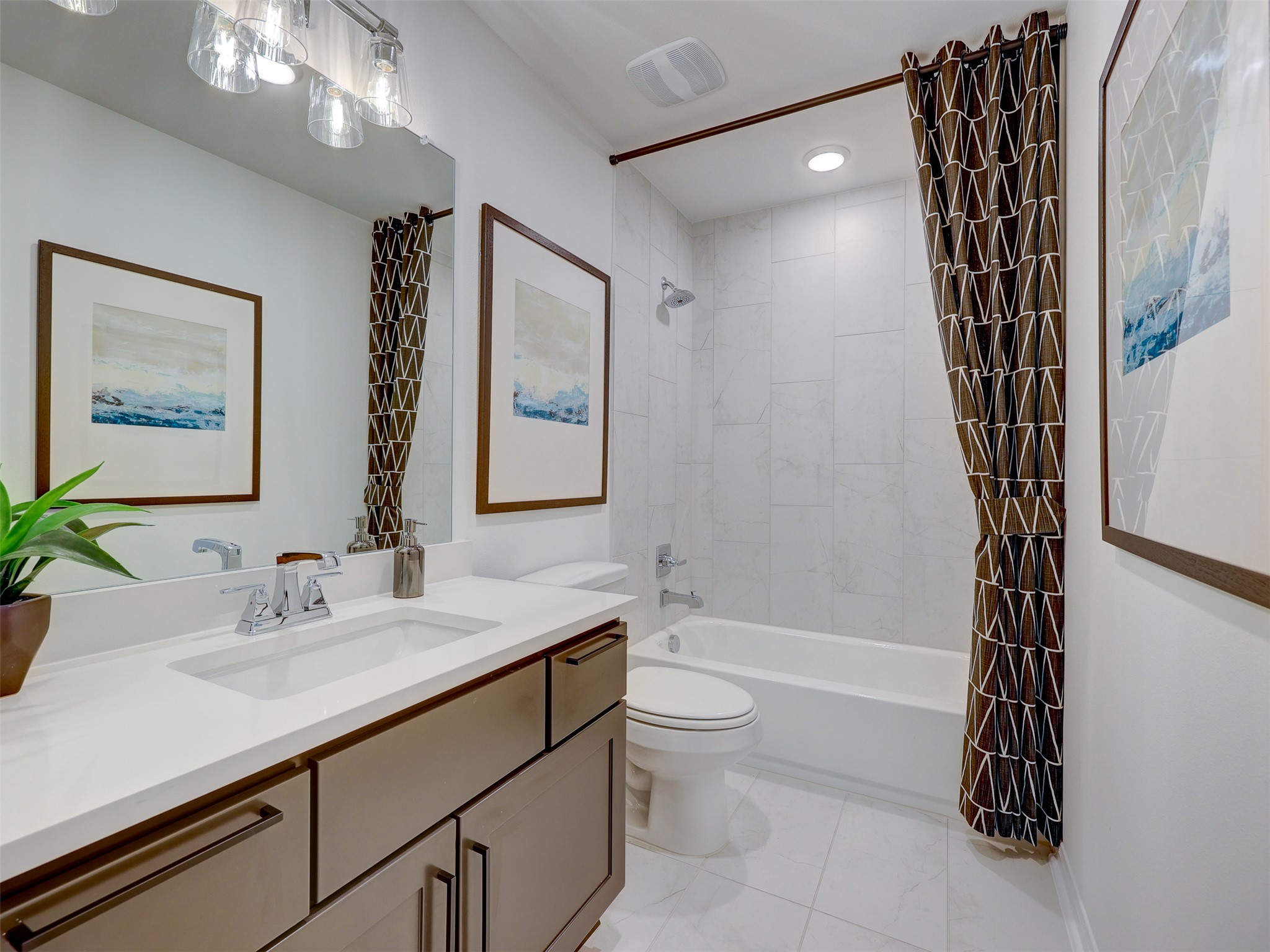 6220 Bower Well Road Austin, TX 78738 - Photo 21 of 28 Clean lines and a spacious vanity define this crisp, modern bathroom.