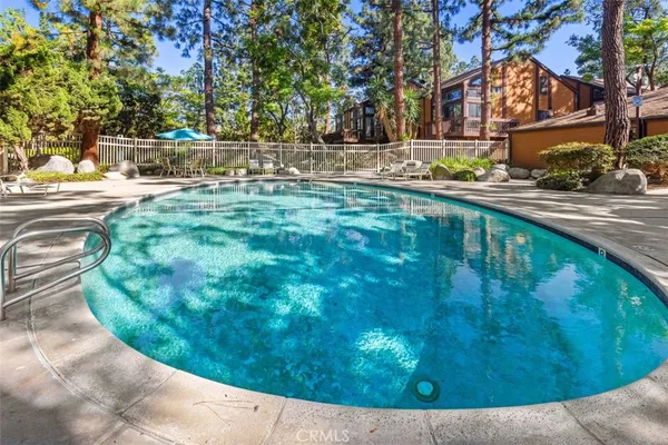 a view of swimming pool from a outdoor space
