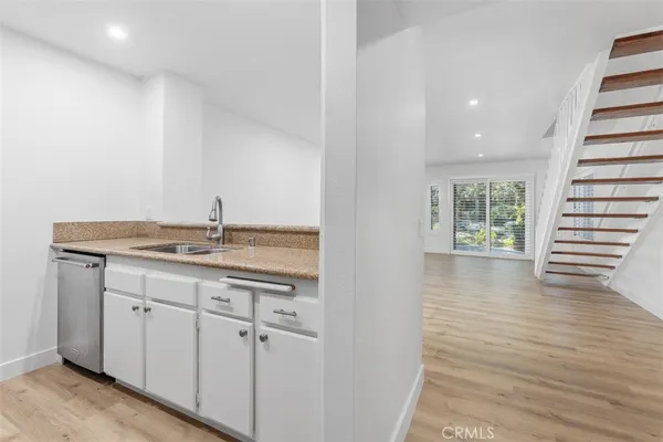 a bathroom with a sink and a window