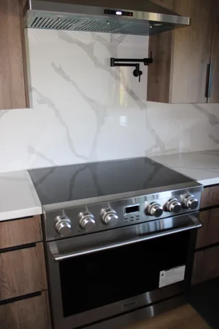 a bathroom with a sink double vanity and shower