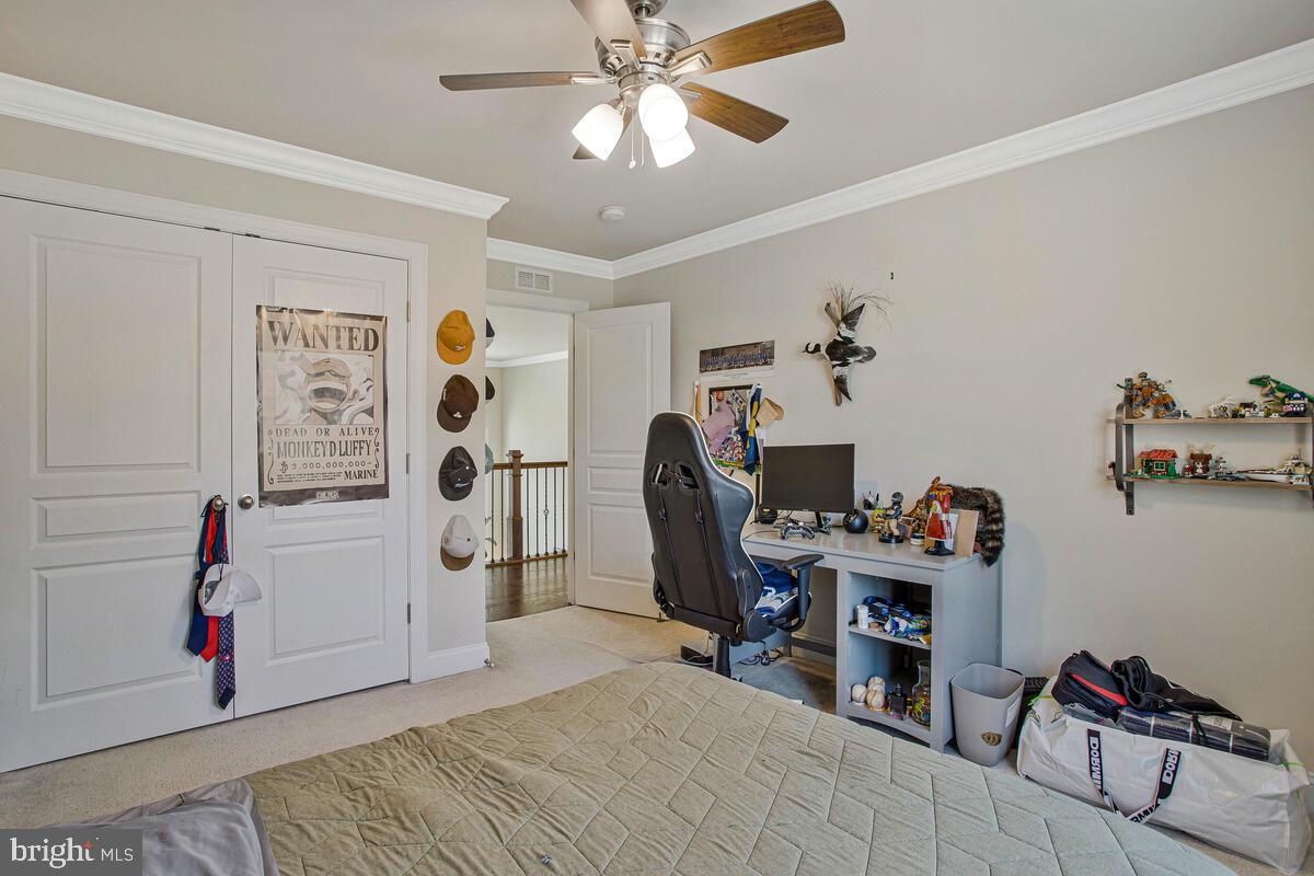 54 Simmons Ridge Road Prince Frederick, MD 20678 - Photo 30 of 55 a bedroom with a workspace