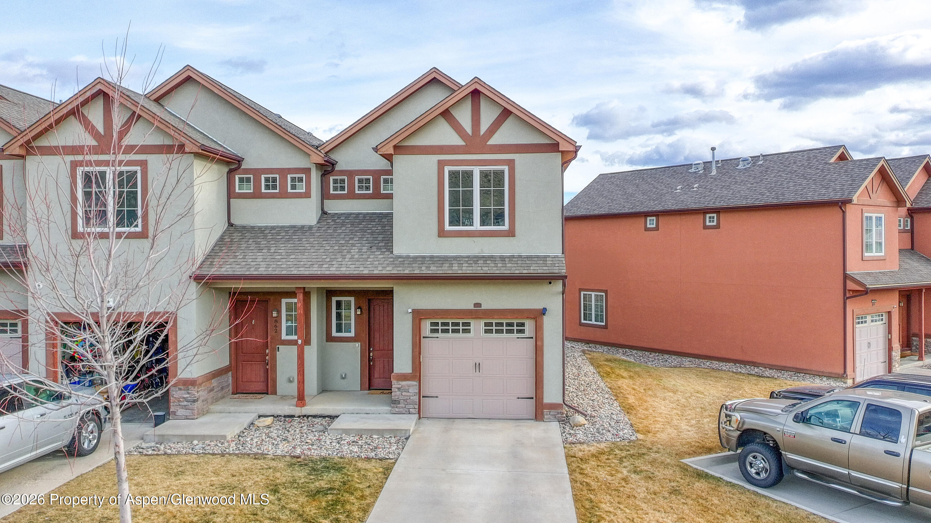 860 West 24th Street Rifle, CO 81650 - Photo 3 of 12 a front view of a house with garden