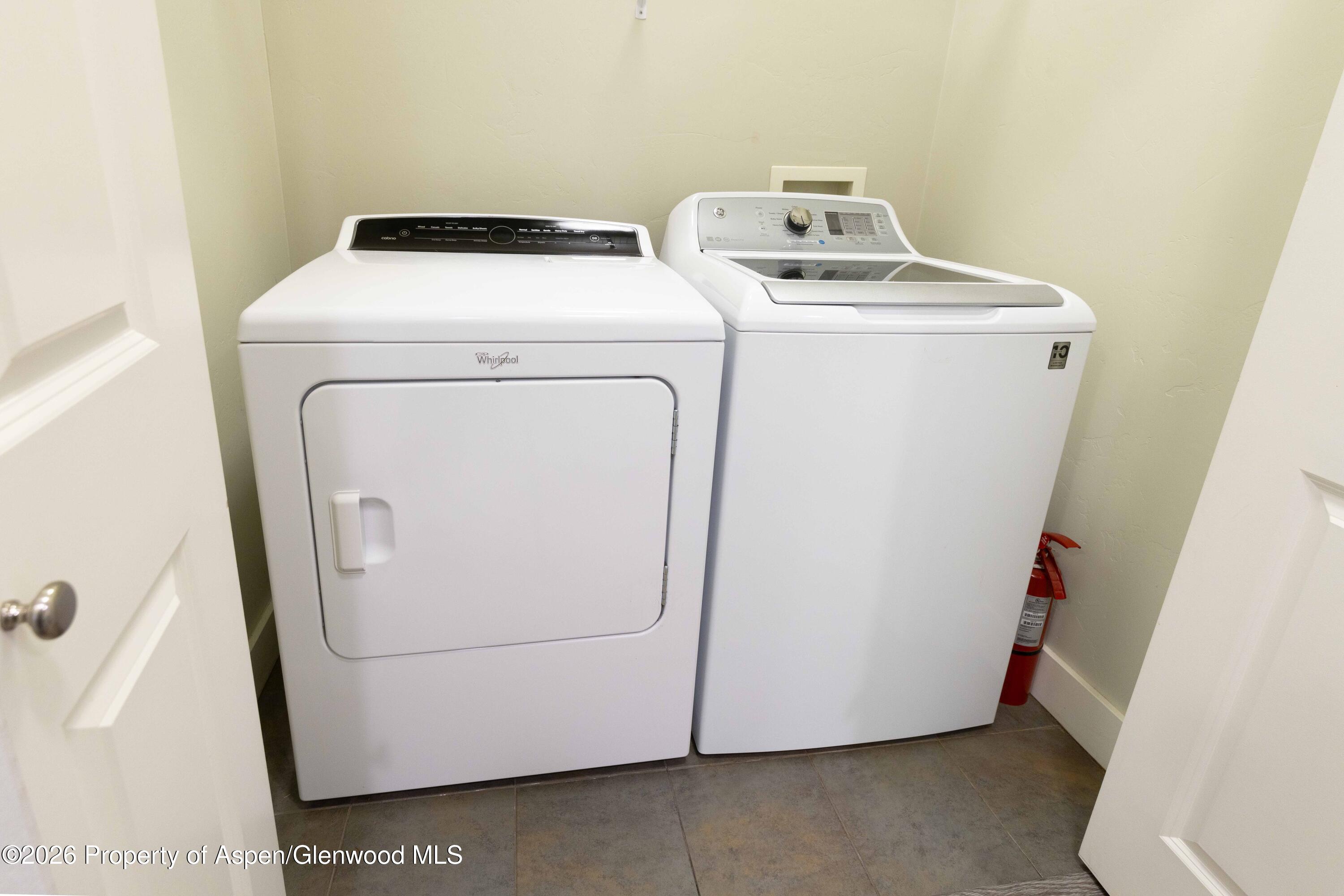 860 West 24th Street Rifle, CO 81650 - Photo 6 of 12 a utility room with dryer and washer