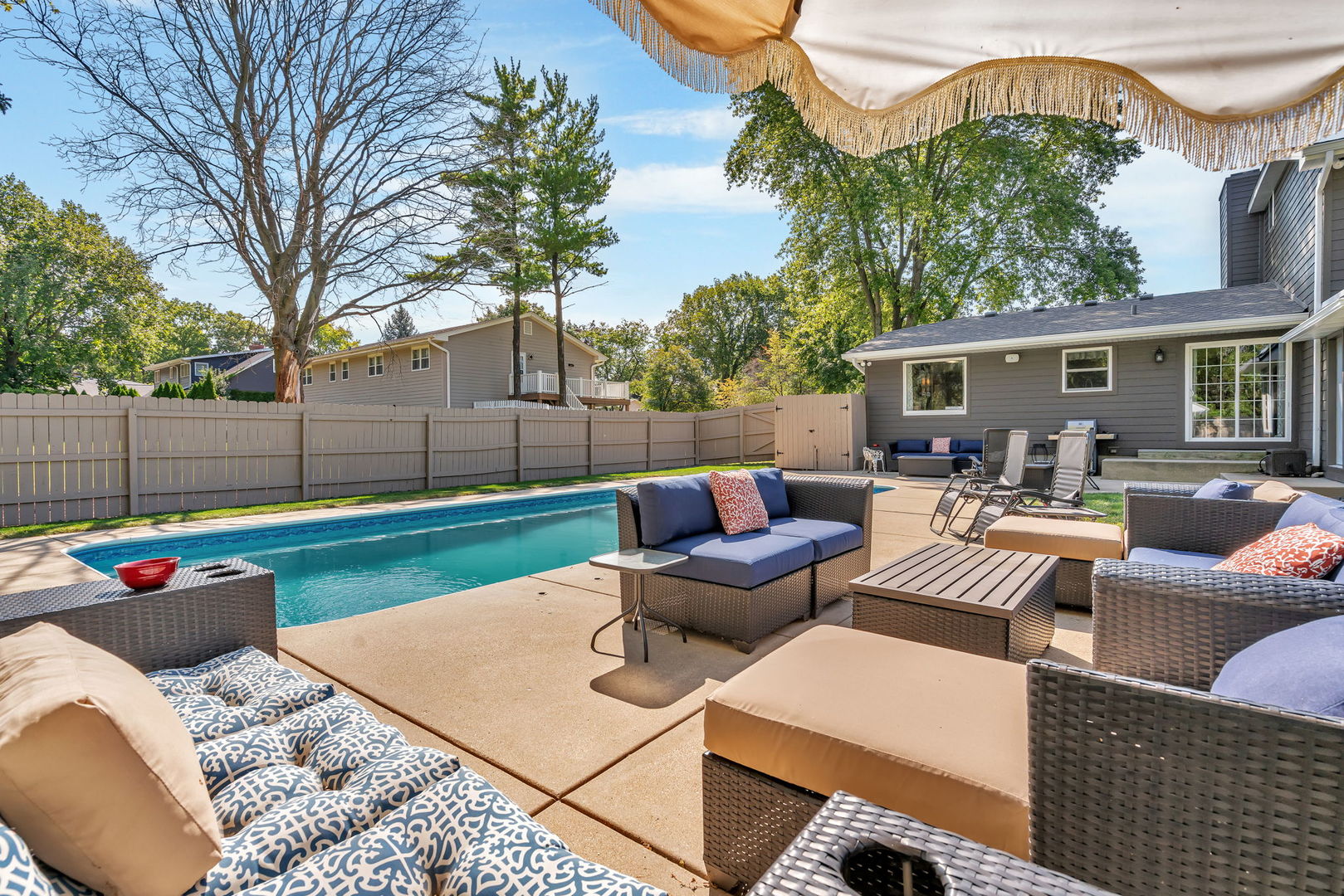 3509 Green Meadow Lane Joliet, IL 60431 - Photo 11 of 44 a view of a patio with couches chairs and a fire pit