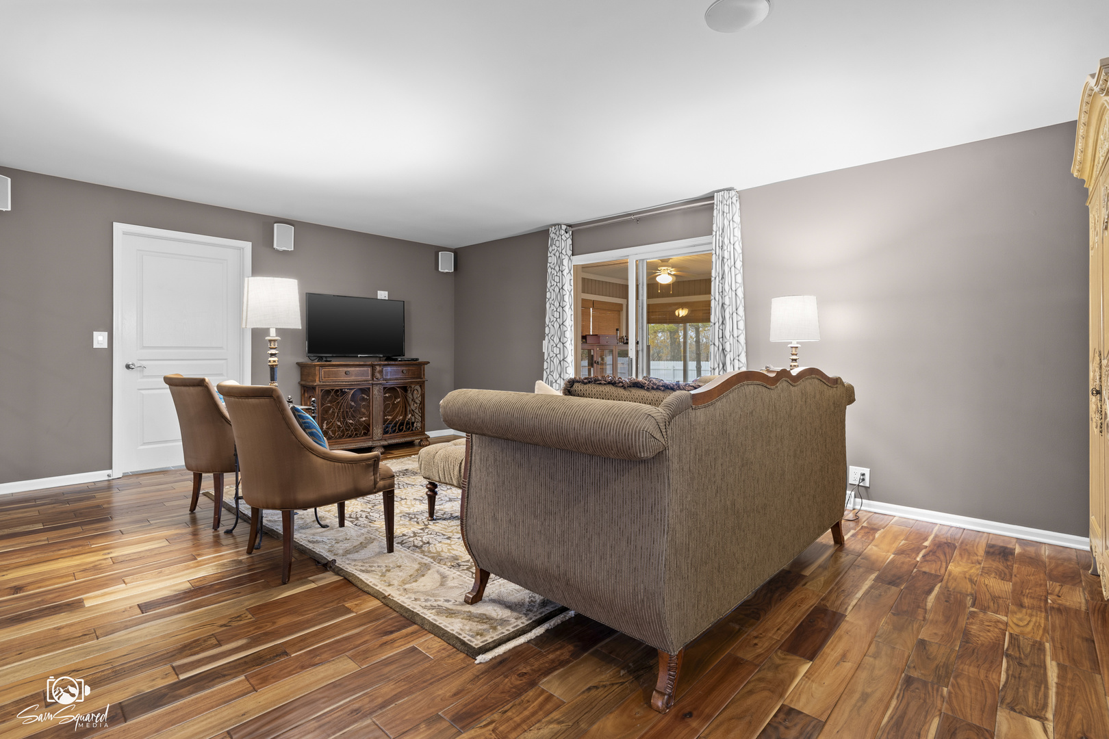 3509 Green Meadow Lane Joliet, IL 60431 - Photo 18 of 44 a living room with furniture and a flat screen tv