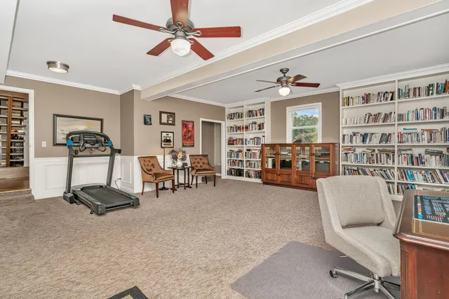 a view of a livingroom with furniture and a flat screen tv
