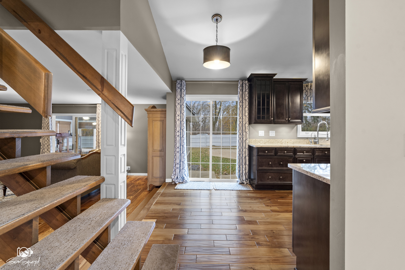 3509 Green Meadow Lane Joliet, IL 60431 - Photo 24 of 44 a kitchen with stainless steel appliances granite countertop a stove and a wooden floors