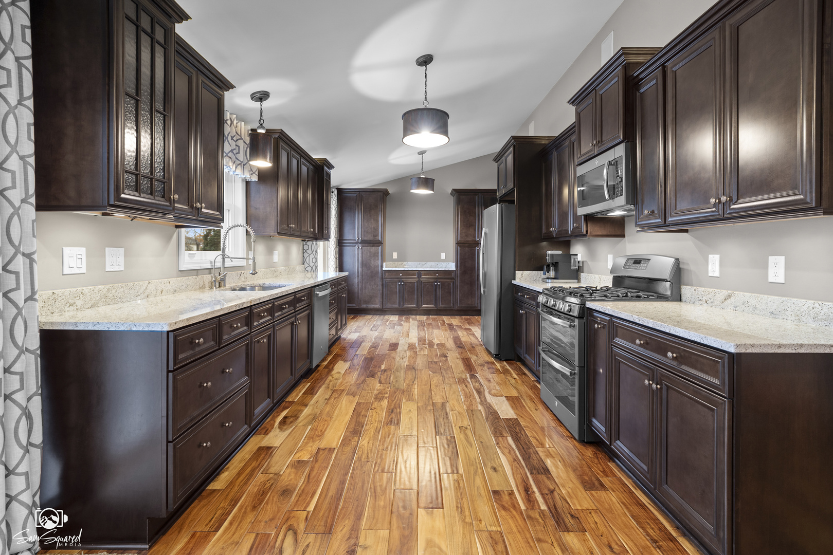 3509 Green Meadow Lane Joliet, IL 60431 - Photo 28 of 44 a large kitchen with stainless steel appliances granite countertop plenty wooden cabinets counter space a sink and a stove