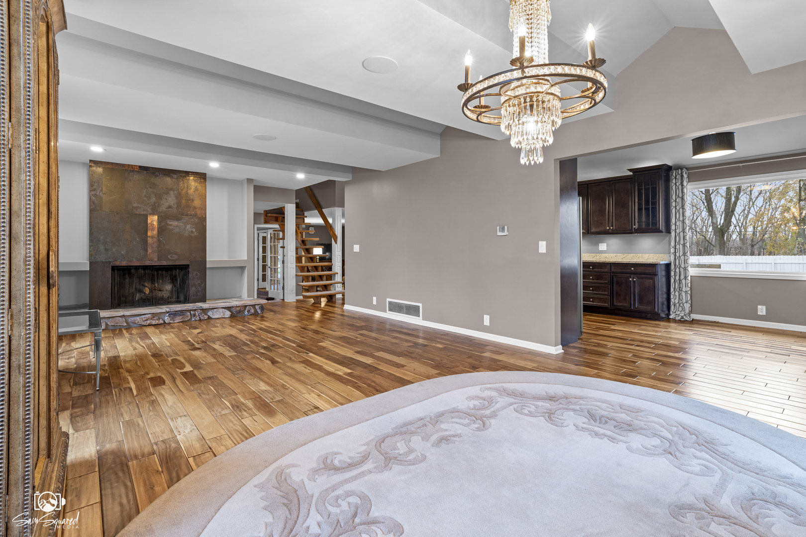 3509 Green Meadow Lane Joliet, IL 60431 - Photo 31 of 44 a bedroom with a bed and a chandelier