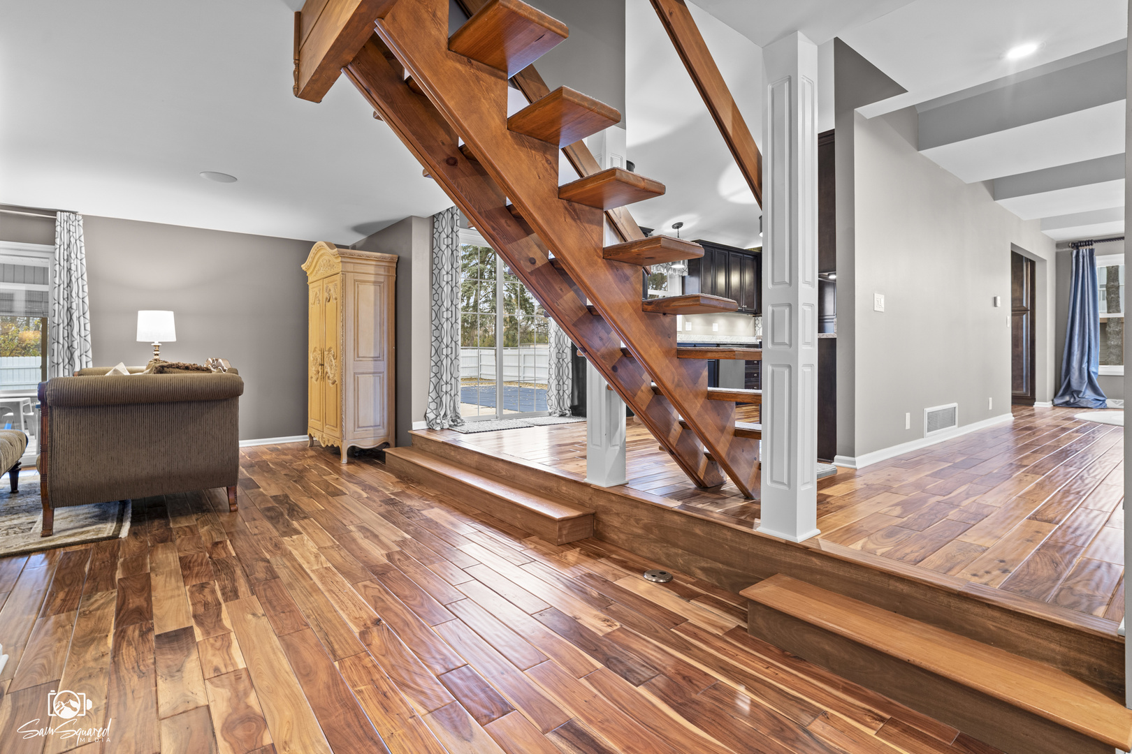 3509 Green Meadow Lane Joliet, IL 60431 - Photo 32 of 44 a view of an entryway with wooden floor and livingroom