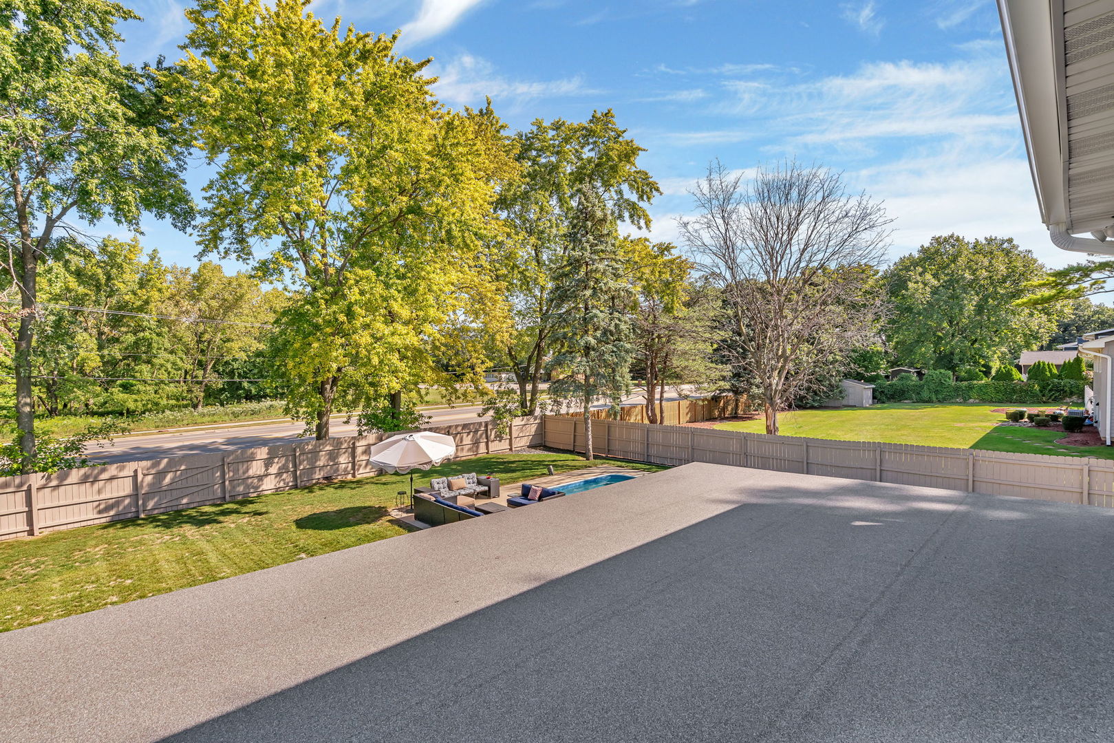 3509 Green Meadow Lane Joliet, IL 60431 - Photo 6 of 44 a view of swimming pool with an outdoor space and seating area