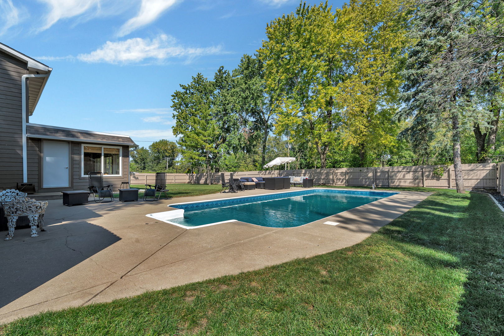 3509 Green Meadow Lane Joliet, IL 60431 - Photo 9 of 44 a view of a house with swimming pool and sitting area