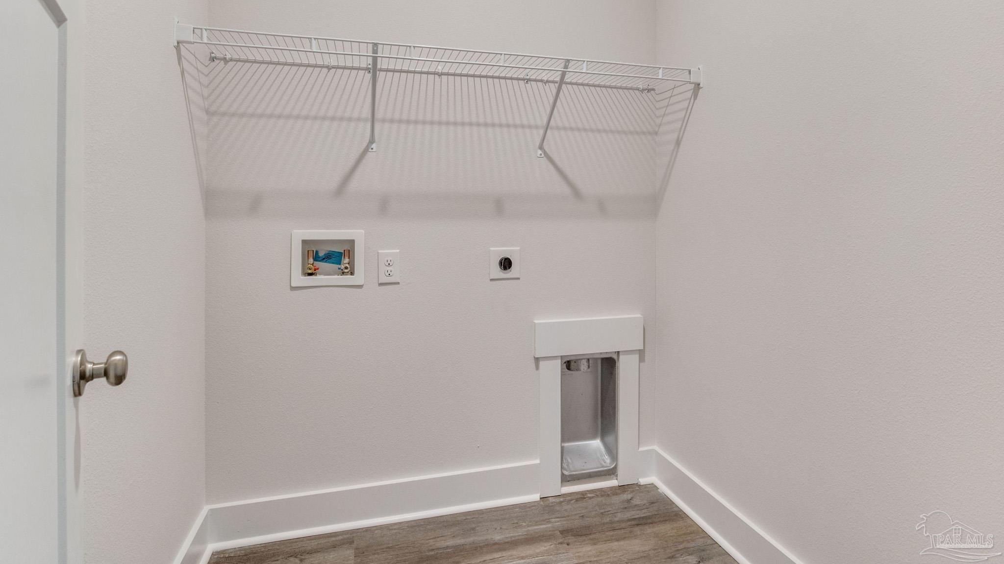 3463 Crossvine Road Cantonment, FL 32533 - Photo 22 of 33 a view of a room with racks on the wall