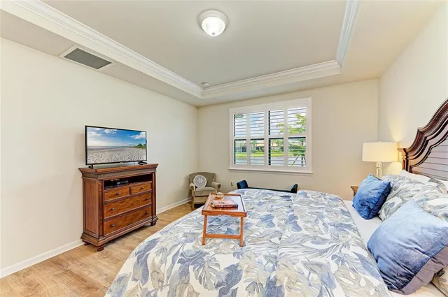a bathroom with a granite countertop sink mirror and a shower