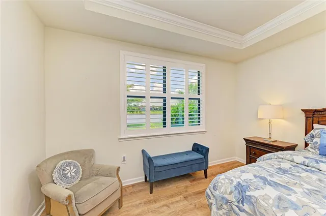 a spacious bathroom with a granite countertop double vanity sink mirror and shower