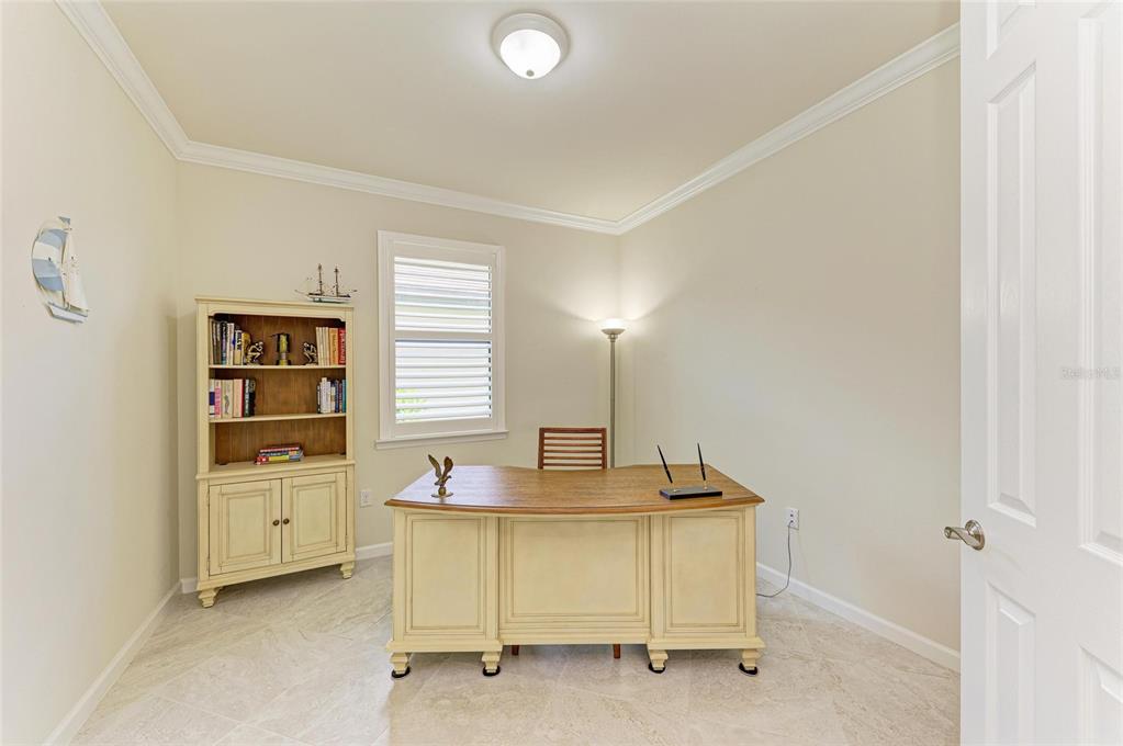 6756 Chester Trail Lakewood Ranch, FL 34202 - Photo 34 of 62 a room with furniture and window