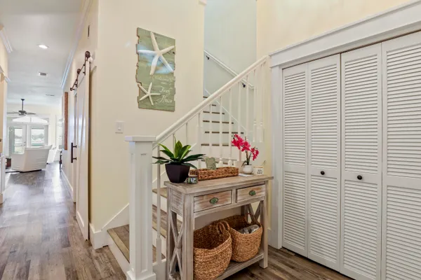 a view of entryway with wooden floor
