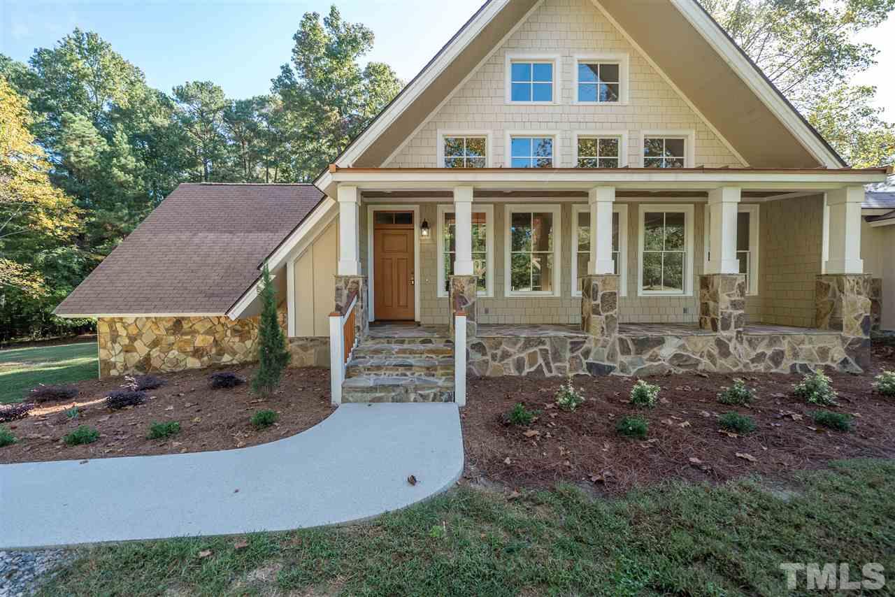 11908 Six Forks Road Raleigh, NC 27614 - Photo 3 of 25 front view of a house with a yard