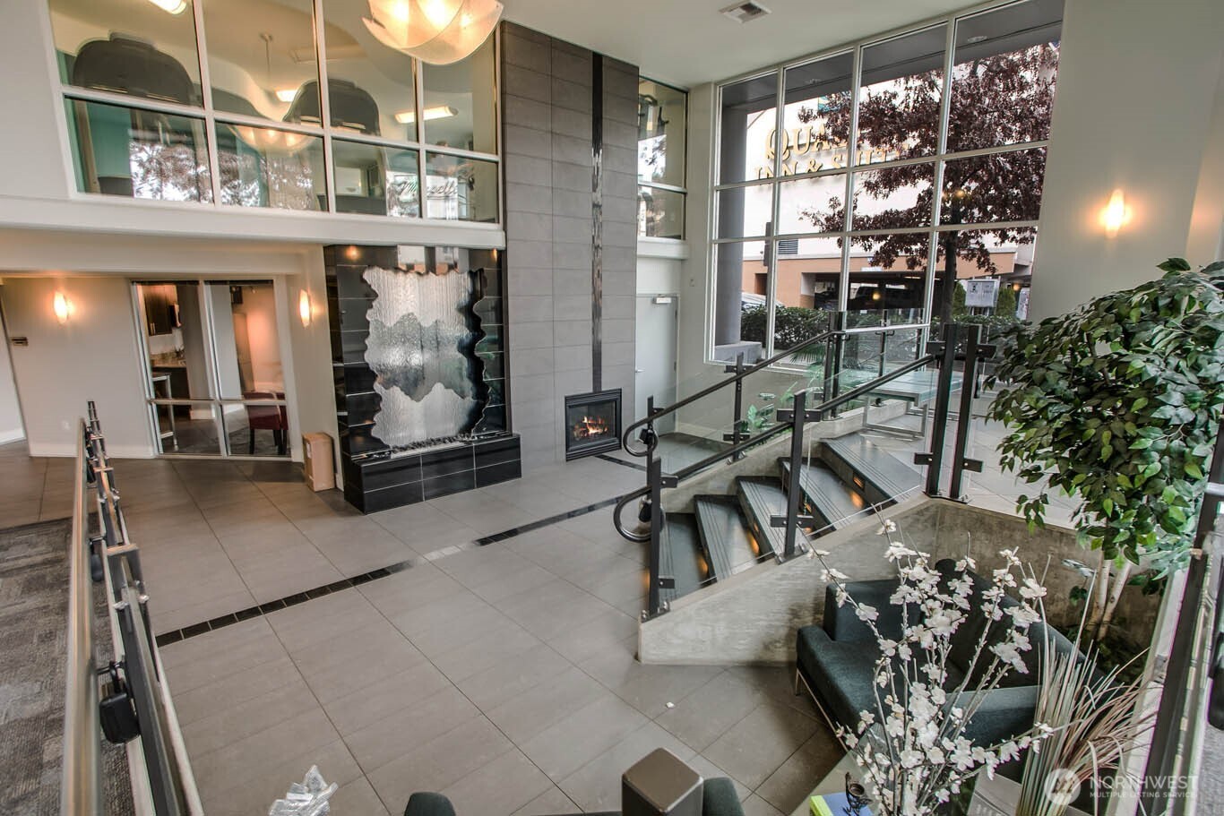 699 John Street, Unit 513 Seattle, WA 98109 - Photo 25 of 33 a view of entryway with a chandelier and living room