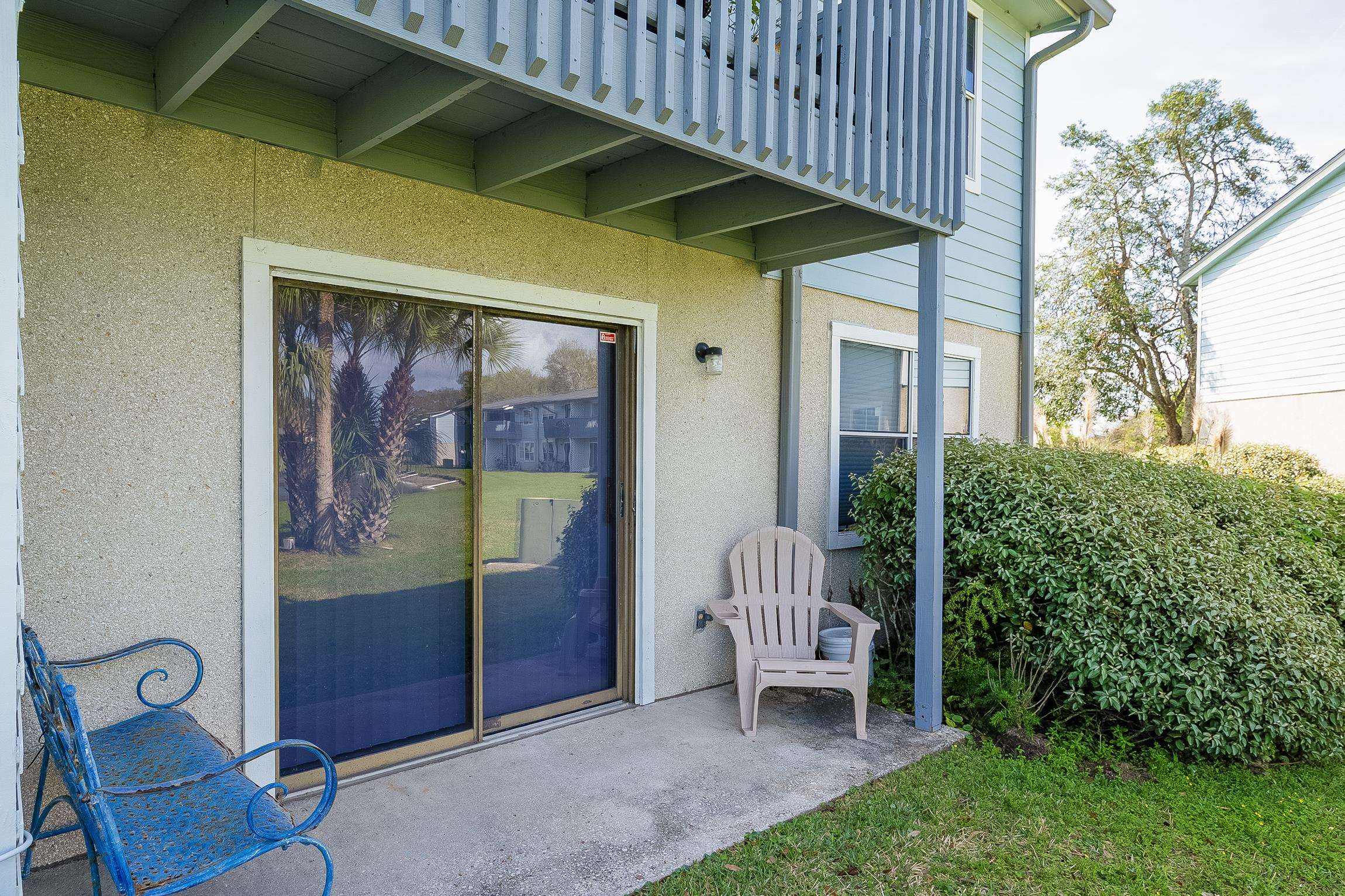 700 West Pope Road, Unit H57 St. Augustine, FL 32080 - Photo 17 of 52 Entrance to property featuring stucco siding and a patio