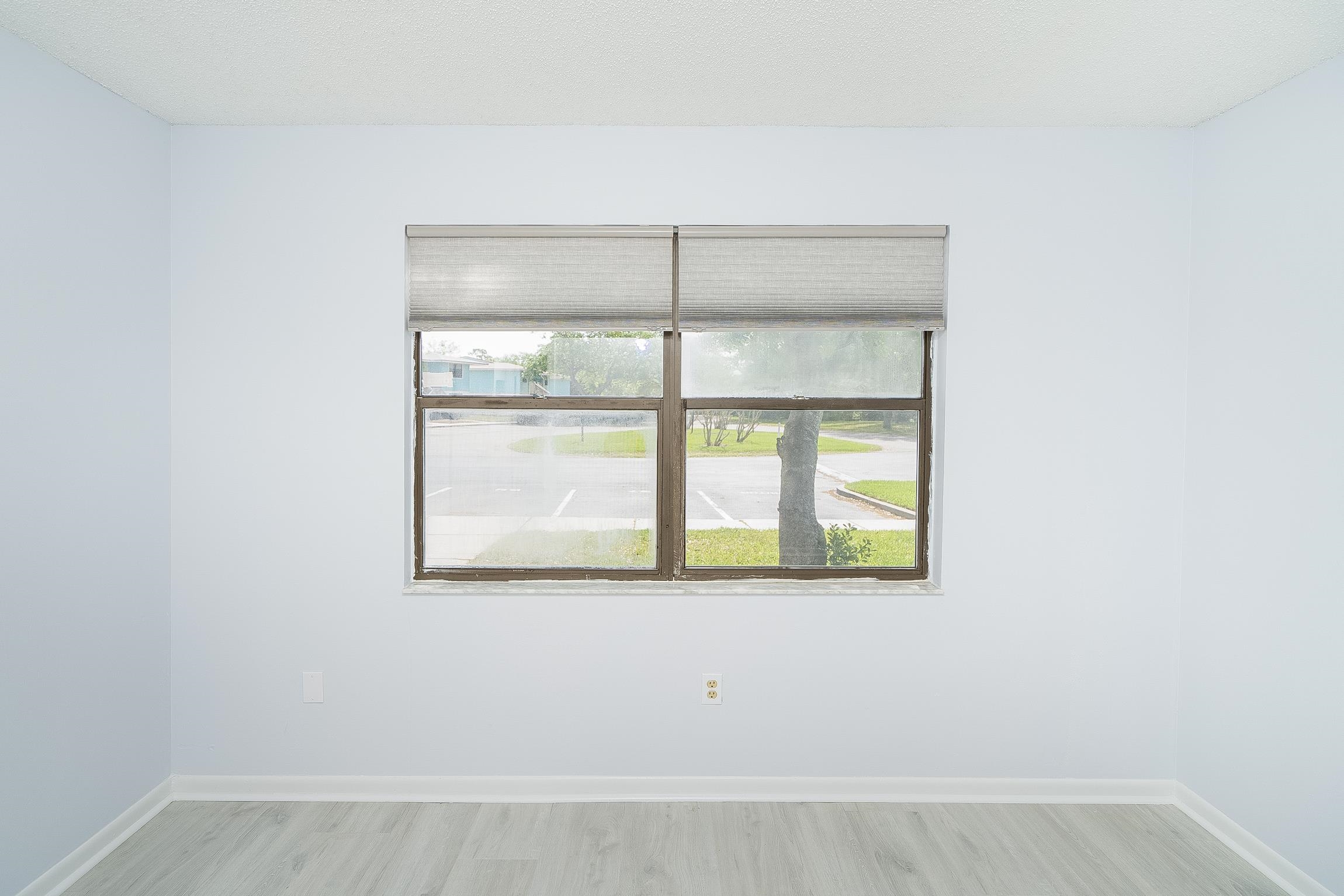 700 West Pope Road, Unit H57 St. Augustine, FL 32080 - Photo 19 of 52 Unfurnished room with baseboards and light wood-style flooring