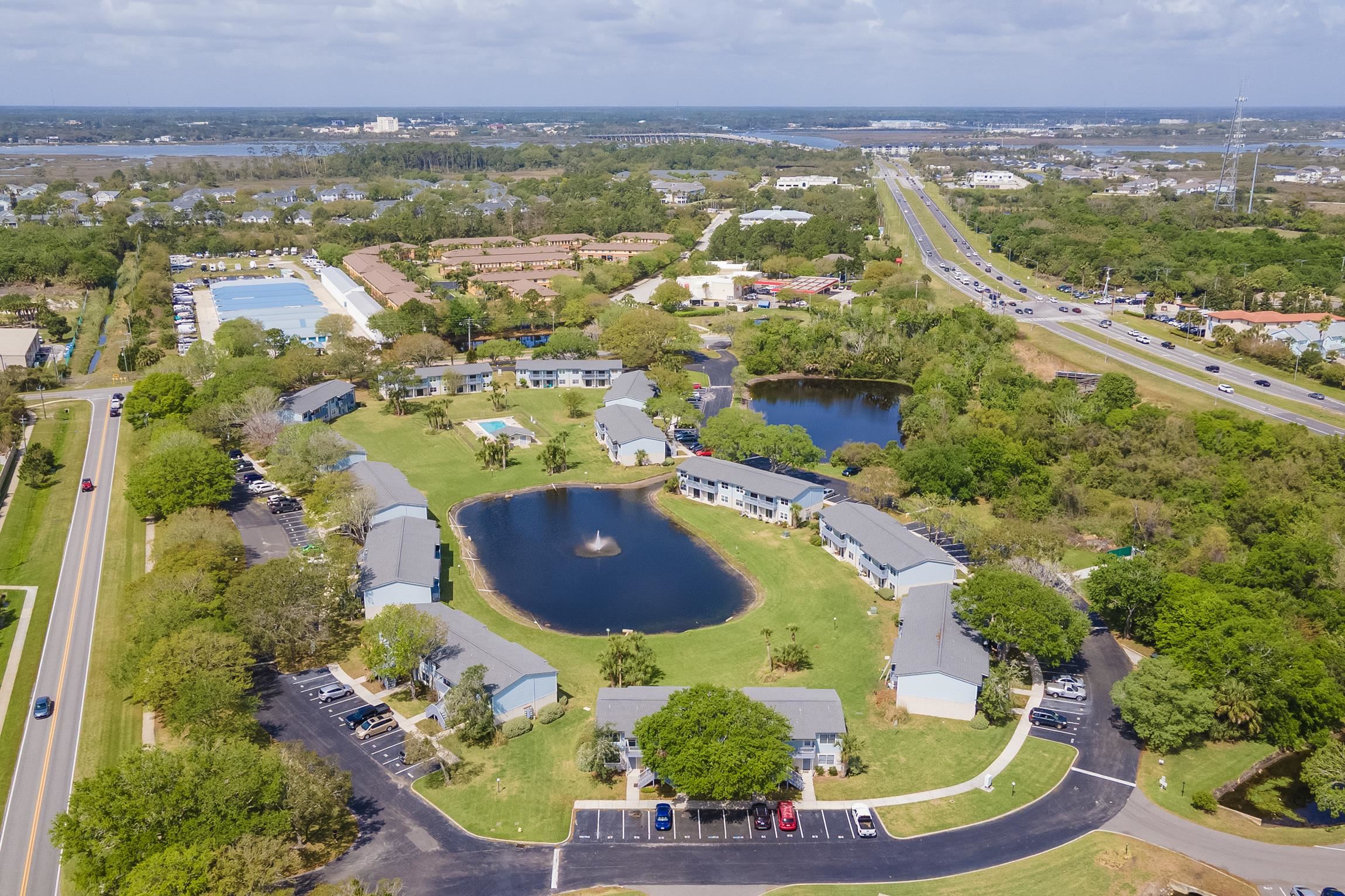 700 West Pope Road, Unit H57 St. Augustine, FL 32080 - Photo 30 of 52 Aerial view of property and surrounding area featuring a large body of water