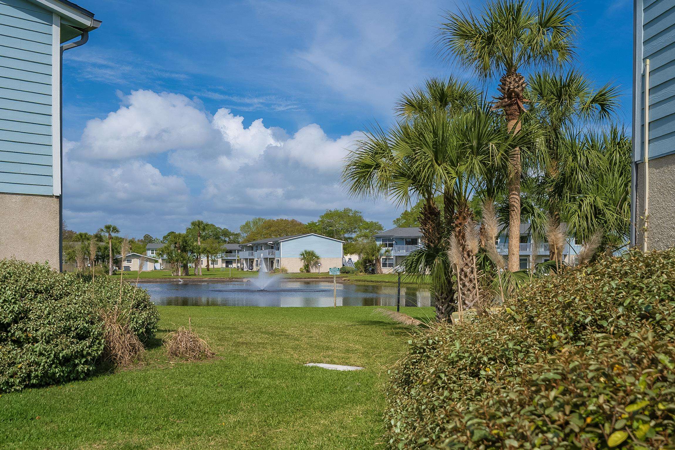 700 West Pope Road, Unit H57 St. Augustine, FL 32080 - Photo 4 of 52 View of green lawn featuring a water view and a residential view