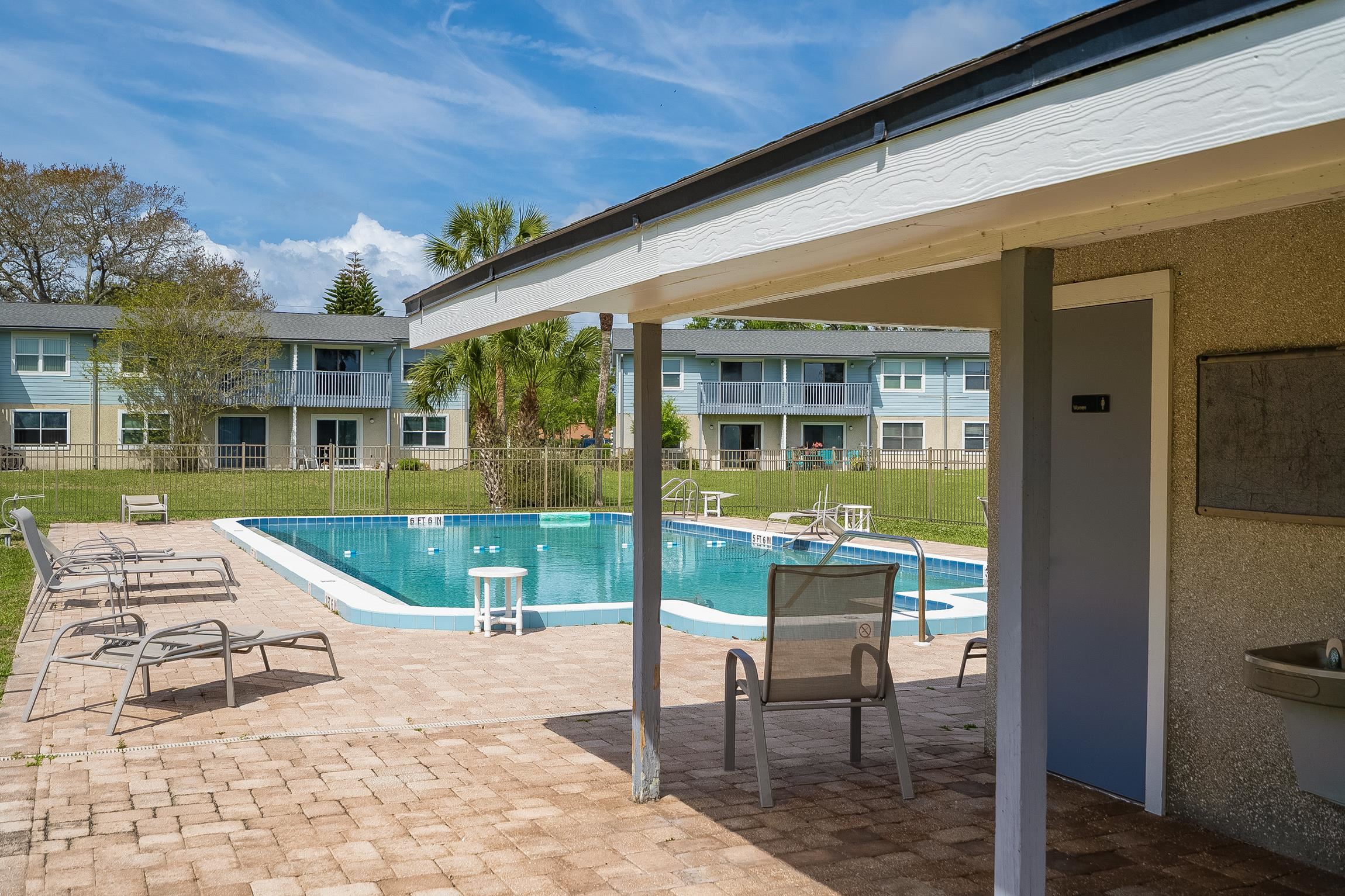 700 West Pope Road, Unit H57 St. Augustine, FL 32080 - Photo 48 of 52 Community pool featuring a patio area