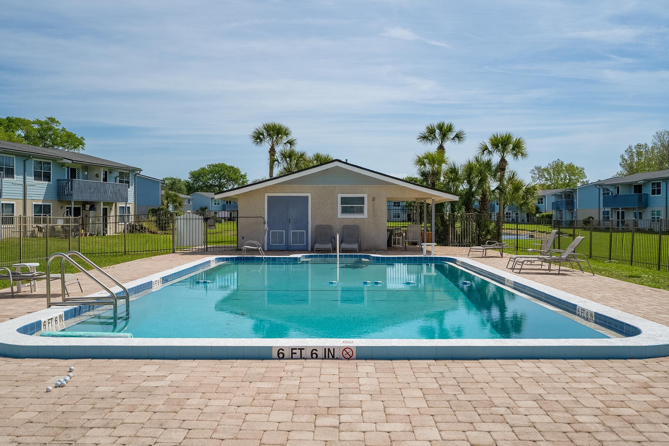 700 West Pope Road, Unit H57 St. Augustine, FL 32080 - Photo 49 of 52 Community pool with a patio area and a residential view