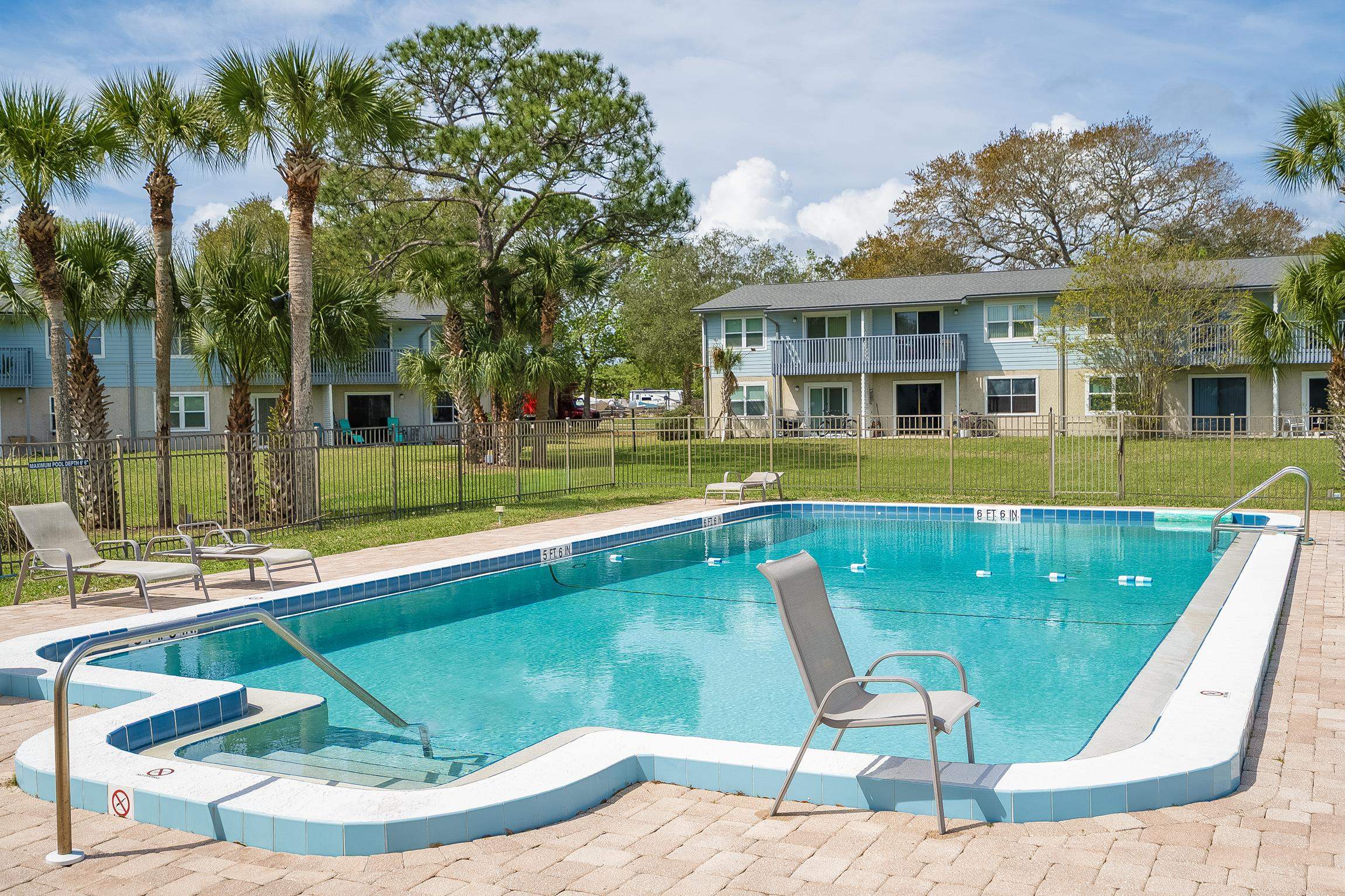 700 West Pope Road, Unit H57 St. Augustine, FL 32080 - Photo 50 of 52 Community pool featuring a patio