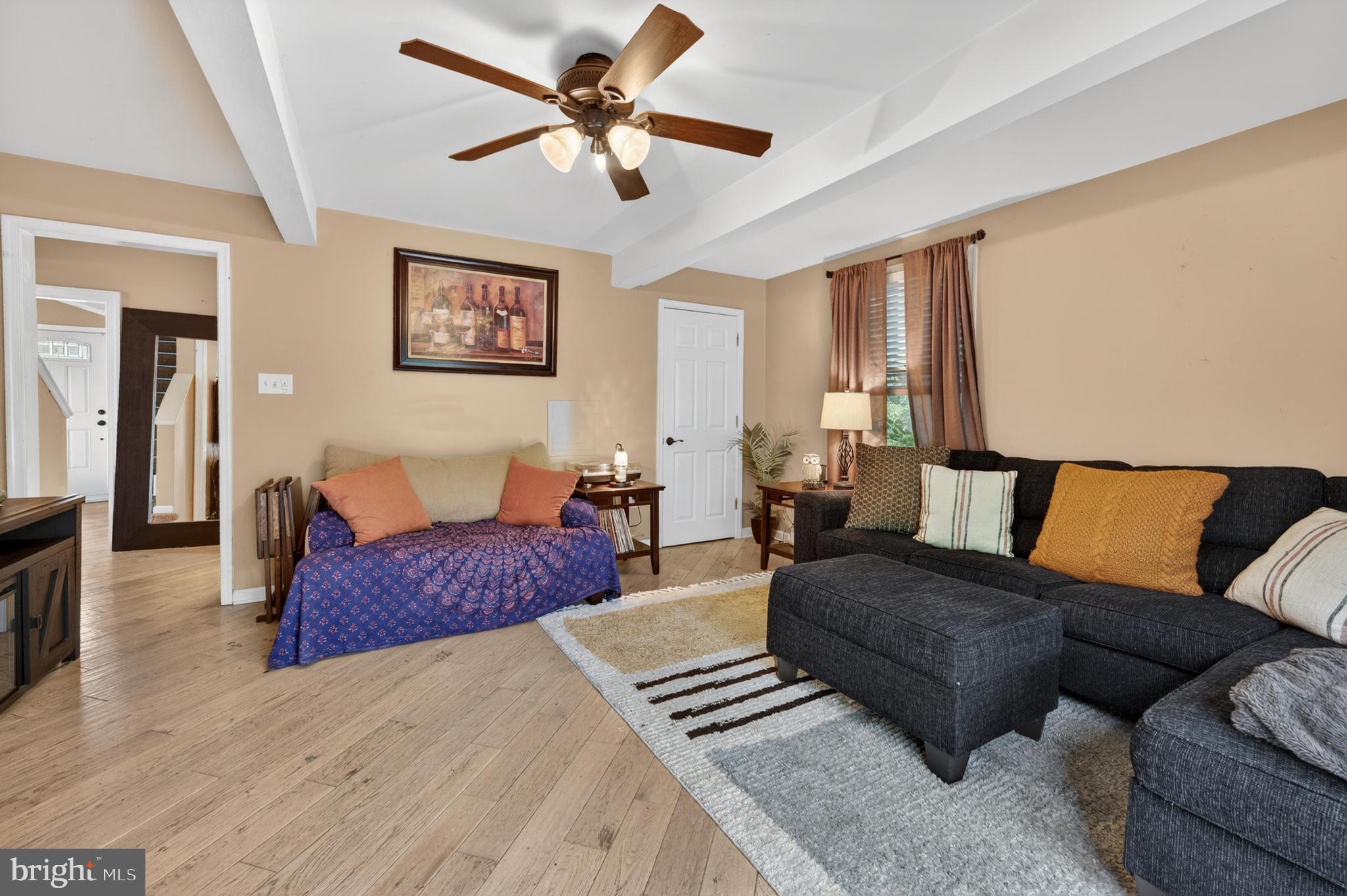 306 Anna Avenue Maple Shade, NJ 08052 - Photo 10 of 31 Cozy living space with warm tones.
