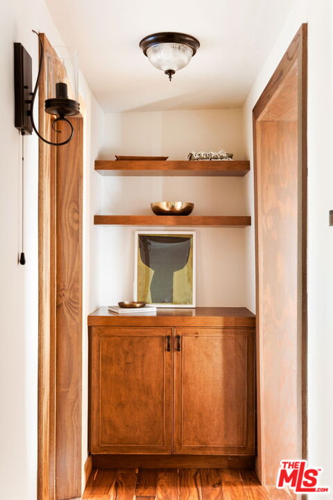 7900 Rim Canyon Road Sunland, CA 91040 - Photo 21 of 46 a kitchen with a refrigerator and cabinets