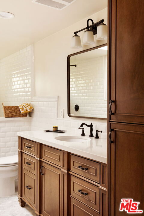 7900 Rim Canyon Road Sunland, CA 91040 - Photo 25 of 46 a bathroom with a sink and a mirror