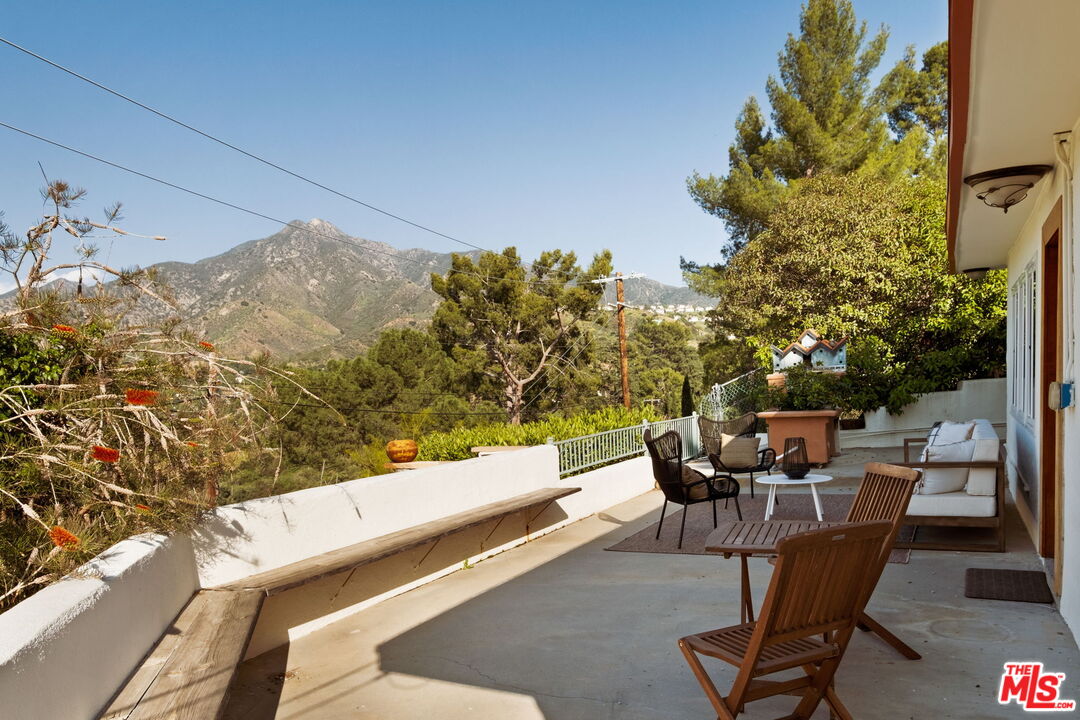 7900 Rim Canyon Road Sunland, CA 91040 - Photo 28 of 46 a view of a chairs and table in patio