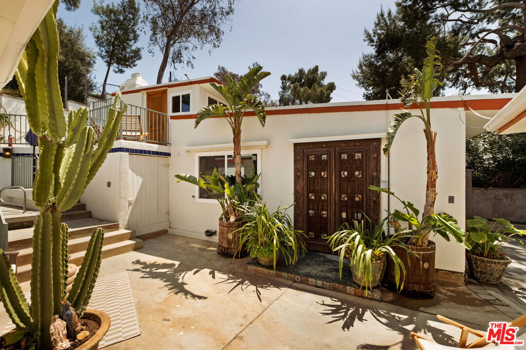 7900 Rim Canyon Road Sunland, CA 91040 - Photo 34 of 46 a view of front door and potted plants